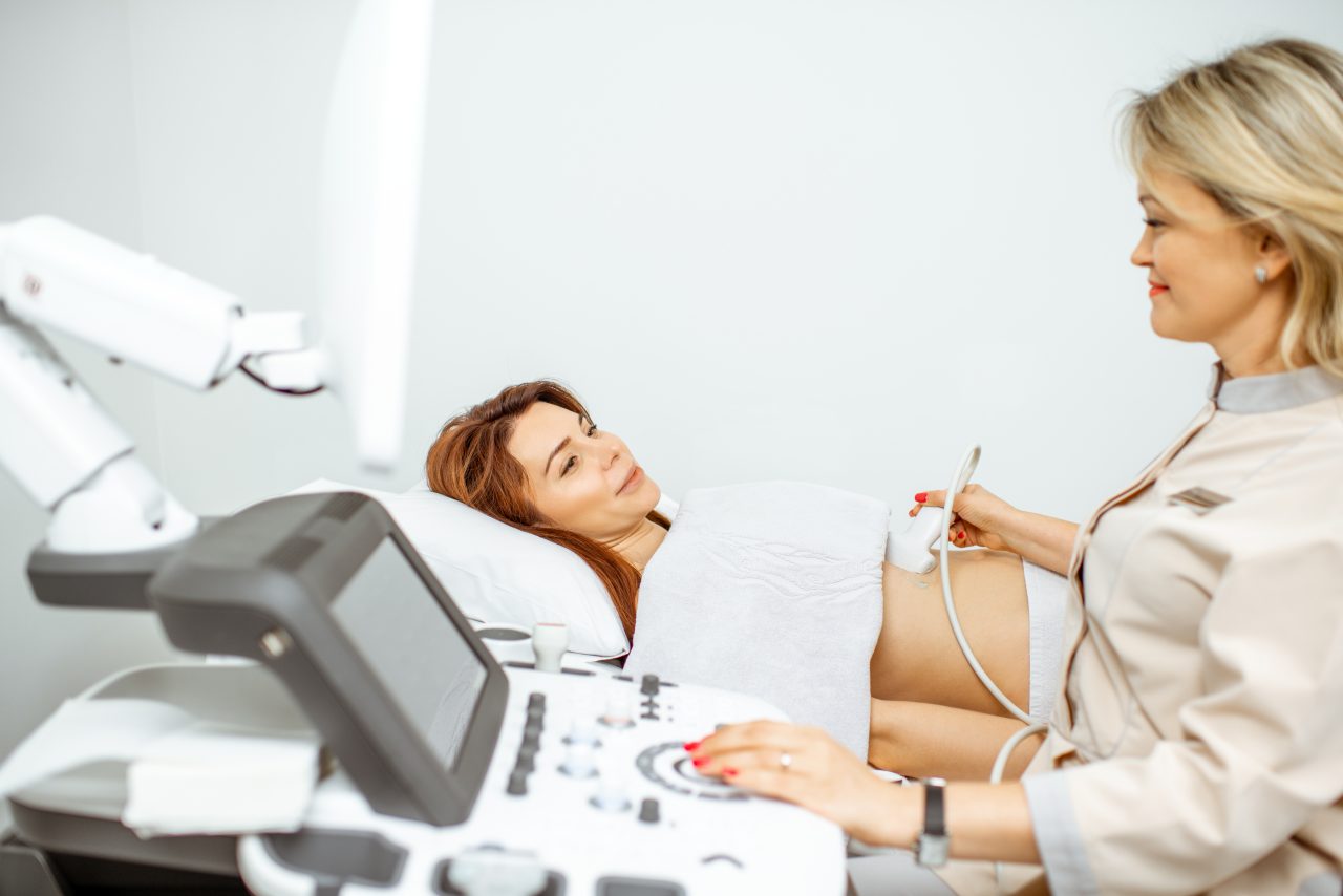 doctor-performs-ultrasound-examination-of-a-woman-e1700694825953.jpg